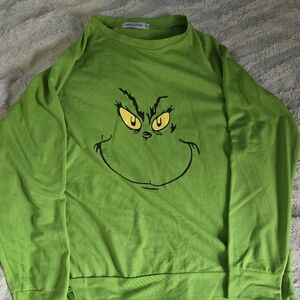 Bright Green Graphic Tee with Yellow Character Eyes